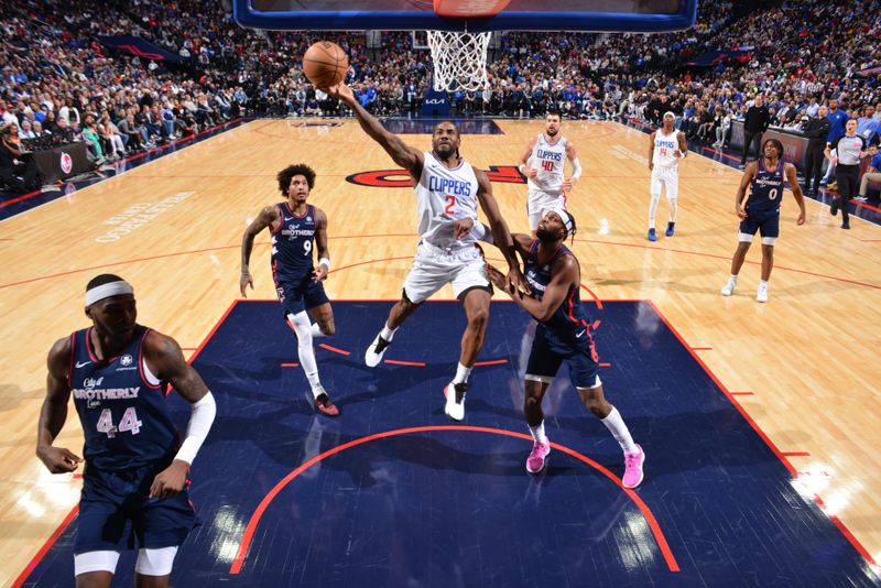 PHILADELPHIA, PA - MARCH 27: Kawhi Leonard #2 of the LA Clippers drives to the basket during the game against the Philadelphia 76ers on March 27, 2024 at the Wells Fargo Center in Philadelphia, Pennsylvania NOTE TO USER: User expressly acknowledges and agrees that, by downloading and/or using this Photograph, user is consenting to the terms and conditions of the Getty Images License Agreement. Mandatory Copyright Notice: Copyright 2024 NBAE (Photo by Jesse D. Garrabrant/NBAE via Getty Images)