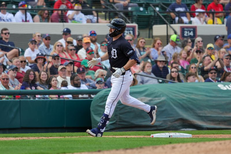 Feb 27, 2025; Lakeland, Florida, USA; Detroit Tigers catcher Jake Rogers (34) rounds third after hitting a home run during the fourth inning against the Boston Red Sox at Publix Field at Joker Marchant Stadium. Mandatory Credit: Mike Watters-Imagn Images