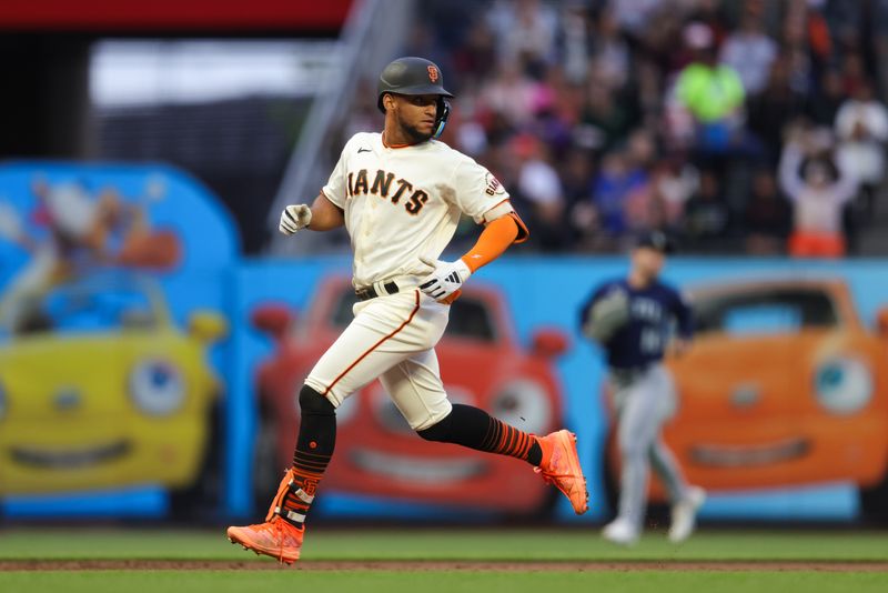 Jul 5, 2023; San Francisco, California, USA; San Francisco Giants outfielder Luis Matos (29) hits a triple during the sixth inning against the Seattle Mariners at Oracle Park. Mandatory Credit: Sergio Estrada-USA TODAY Sports