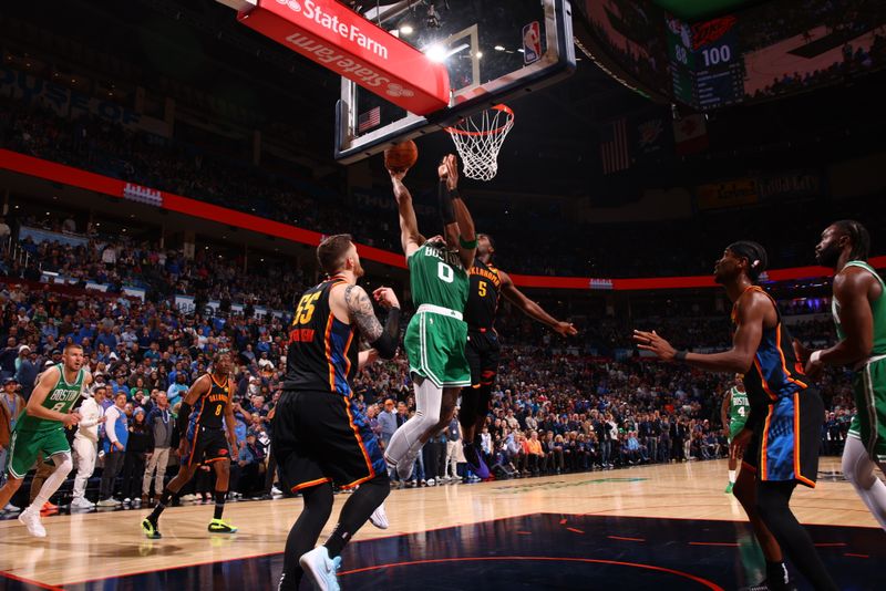 OKLAHOMA CITY, OK - JANUARY 5: Jayson Tatum #0 of the Boston Celtics drives to the basket during the game against the Oklahoma City Thunder on January 5, 2025 at Paycom Center in Oklahoma City, Oklahoma. NOTE TO USER: User expressly acknowledges and agrees that, by downloading and or using this photograph, User is consenting to the terms and conditions of the Getty Images License Agreement. Mandatory Copyright Notice: Copyright 2025 NBAE (Photo by Zach Beeker/NBAE via Getty Images)