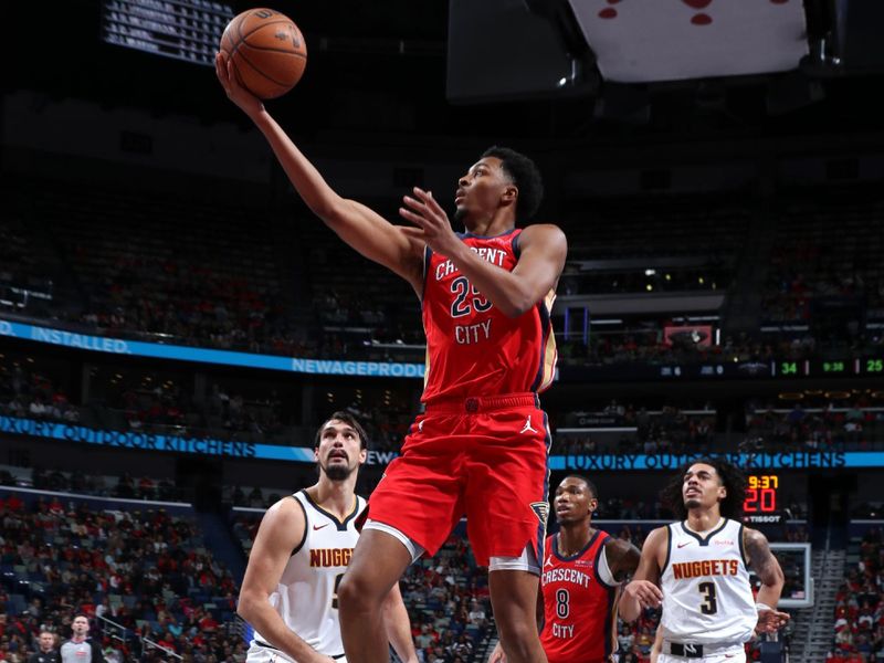 NEW ORLEANS, LA - NOVEMBER 15: Trey Murphy III #25 of the New Orleans Pelicans drives to the basket during the game against the Denver Nuggets during the Emirates NBA Cup game on November 15, 2024 at the Smoothie King Center in New Orleans, Louisiana. NOTE TO USER: User expressly acknowledges and agrees that, by downloading and or using this Photograph, user is consenting to the terms and conditions of the Getty Images License Agreement. Mandatory Copyright Notice: Copyright 2024 NBAE (Photo by Layne Murdoch Jr./NBAE via Getty Images)