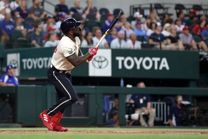 Sep 2, 2023; Arlington, Texas, USA; Texas Rangers right fielder Adolis Garcia (53) hits a two run home run against the Minnesota Twins in the first inning at Globe Life Field. Mandatory Credit: Tim Heitman-USA TODAY Sports