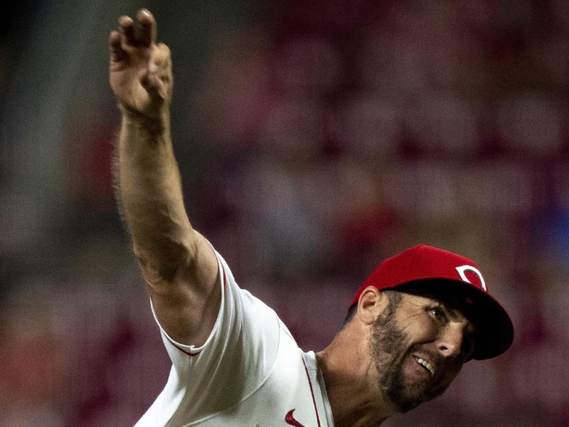 Sep 6, 2023; Cincinnati, Ohio, USA; Cincinnati Reds relief pitcher Kevin Herget (57) delivers a pitch in the eighth inning of the MLB baseball game between the Cincinnati Reds and the Seattle Mariners at Great American Ball Park. Mandatory Credit: Albert Cesare-USA TODAY Sports