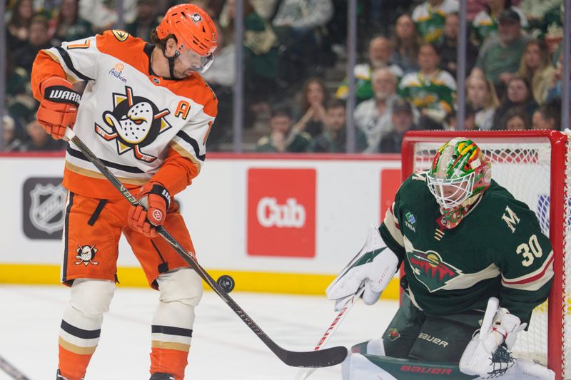 Apr 14, 2026; Saint Paul, Minnesota, USA; Anaheim Ducks left wing Alex Killorn (17) plays a deflection in front of Minnesota Wild goaltender Jesper Wallstedt (30) in the first period at Grand Casino Arena. Mandatory Credit: Matt Blewett-Imagn Images