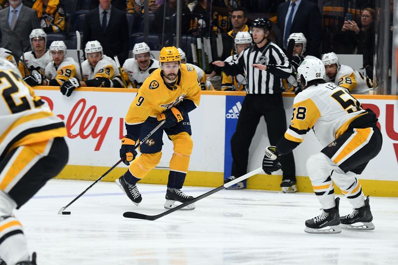 Nov 28, 2023; Nashville, Tennessee, USA; Nashville Predators left wing Filip Forsberg (9) skates with the puck during the first period against the Pittsburgh Penguins at Bridgestone Arena. Mandatory Credit: Christopher Hanewinckel-USA TODAY Sports