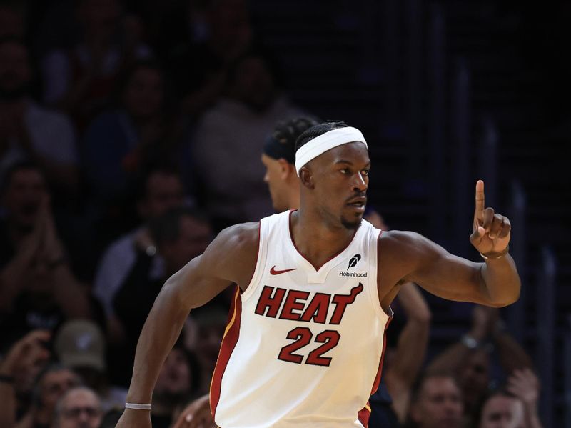 MIAMI, FLORIDA - OCTOBER 23: Jimmy Butler #22 of the Miami Heat reacts to a basket against the Orlando Magic during the second half at Kaseya Center on October 23, 2024 in Miami, Florida. NOTE TO USER: User expressly acknowledges and agrees that, by downloading and or using this photograph, User is consenting to the terms and conditions of the Getty Images License Agreement. (Photo by Carmen Mandato/Getty Images)