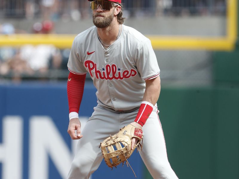 Jul 21, 2024; Pittsburgh, Pennsylvania, USA;  Philadelphia Phillies first baseman Bryce Harper (3) in the field against the Pittsburgh Pirates during the ninth inning at PNC Park.  The Phillies won 6-0. Mandatory Credit: Charles LeClaire-USA TODAY Sports