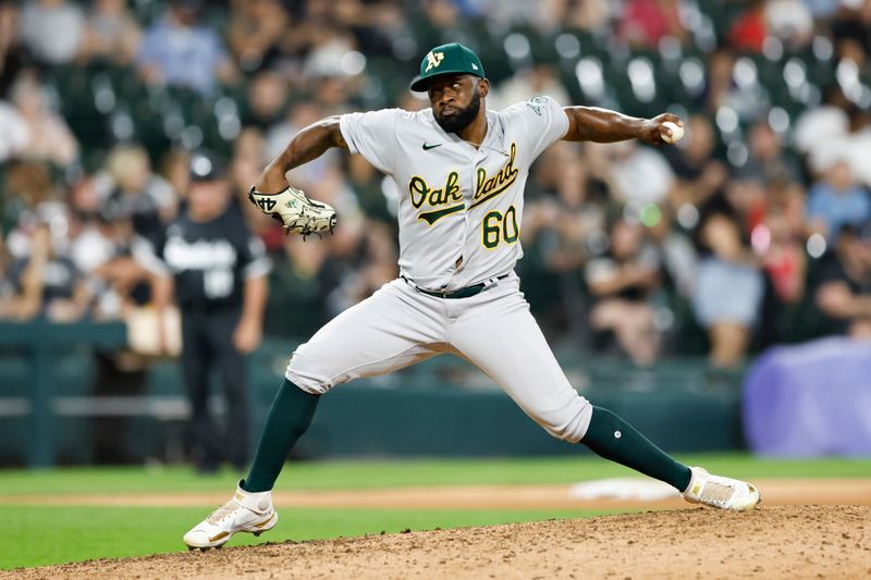 Aug 25, 2023; Chicago, Illinois, USA; Oakland Athletics relief pitcher Francisco Perez (60) delivers a pitch against the Chicago White Sox during the ninth inning at Guaranteed Rate Field. Mandatory Credit: Kamil Krzaczynski-USA TODAY Sports