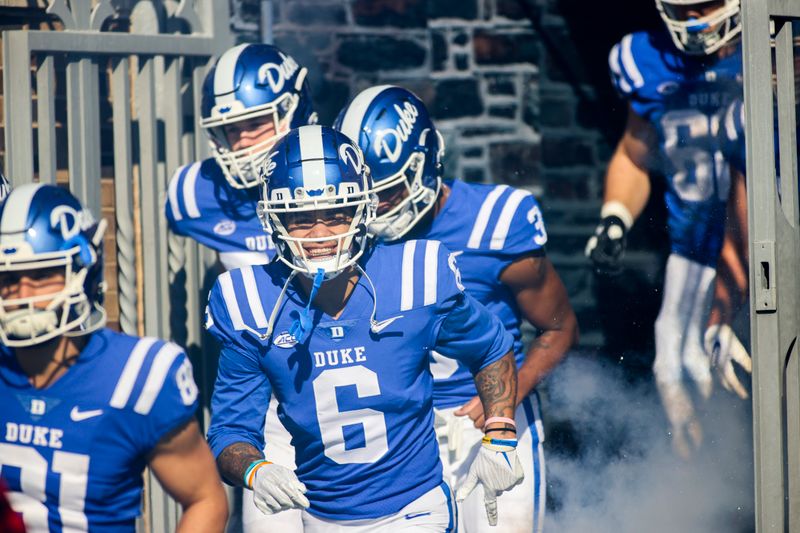 Nov 27, 2021; Durham, North Carolina, USA; Duke Blue Devils wide receiver Eli Pancol (6) smiles as he runs out during the first half of the game against the Miami Hurricanes at Wallace Wade Stadium. at Wallace Wade Stadium. Mandatory Credit: Jaylynn Nash-USA TODAY Sports