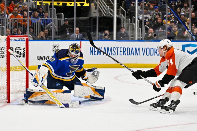 Jan 15, 2024; St. Louis, Missouri, USA;  Philadelphia Flyers right wing Owen Tippett (74) shoots and scores the game winning goal against St. Louis Blues goaltender Joel Hofer (30) during the third period at Enterprise Center. Mandatory Credit: Jeff Curry-USA TODAY Sports