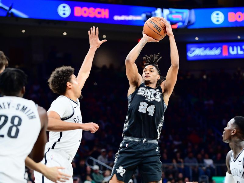 AUSTIN, TX - MARCH 17: Devin Vassell #24 of the San Antonio Spurs shoots the ball during the game against the Brooklyn Nets on March 17, 2024 at the Moody Center in Austin, Texas. NOTE TO USER: User expressly acknowledges and agrees that, by downloading and or using this photograph, user is consenting to the terms and conditions of the Getty Images License Agreement. Mandatory Copyright Notice: Copyright 2024 NBAE (Photos by Michael Gonzales/NBAE via Getty Images)