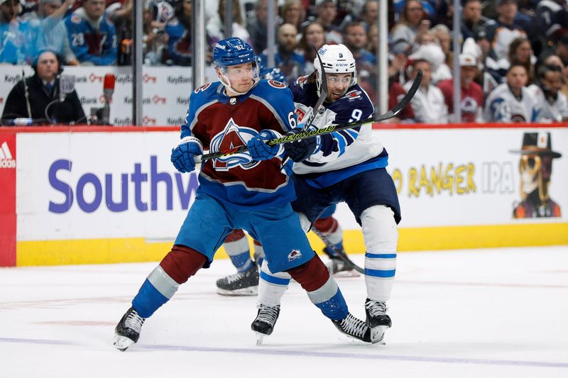 Apr 26, 2024; Denver, Colorado, USA; Colorado Avalanche left wing Artturi Lehkonen (62) and Winnipeg Jets left wing Alex Iafallo (9) battle for position in the second period in game three of the first round of the 2024 Stanley Cup Playoffs at Ball Arena. Mandatory Credit: Isaiah J. Downing-USA TODAY Sports