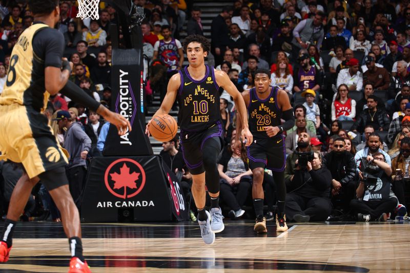 TORONTO, CANADA - APRIL 2: Max Christie #10 of the Los Angeles Lakers dribbles the ball during the game against the Toronto Raptors on April 2, 2024 at the Scotiabank Arena in Toronto, Ontario, Canada.  NOTE TO USER: User expressly acknowledges and agrees that, by downloading and or using this Photograph, user is consenting to the terms and conditions of the Getty Images License Agreement.  Mandatory Copyright Notice: Copyright 2023 NBAE (Photo by Vaughn Ridley/NBAE via Getty Images)