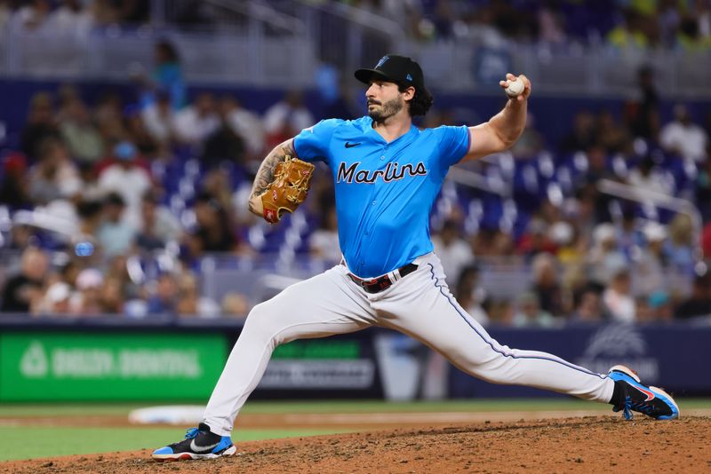 Aug 11, 2024; Miami, Florida, USA; Miami Marlins relief pitcher Andrew Nardi (43) delivers a pitch against the San Diego Padres during the seventh inning at loanDepot Park. Mandatory Credit: Sam Navarro-USA TODAY Sports