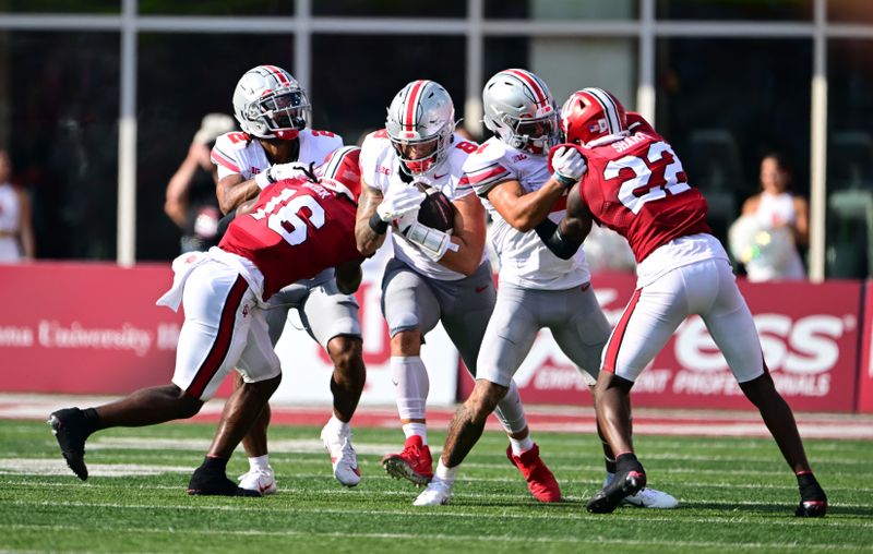 Sep 2, 2023; Bloomington, Indiana, USA; Ohio State Buckeyes tight end Cade Stover (8) runs past Indiana Hoosiers defensive back Jordan Grier (16) during the second half at Memorial Stadium. Mandatory Credit: Marc Lebryk-USA TODAY Sports