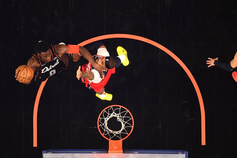 DETROIT, MI - JANUARY 27: Jalen Duren #0 of the Detroit Pistons drives to the basket during the game against the Washington Wizards on January 27, 2024 at Little Caesars Arena in Detroit, Michigan. NOTE TO USER: User expressly acknowledges and agrees that, by downloading and/or using this photograph, User is consenting to the terms and conditions of the Getty Images License Agreement. Mandatory Copyright Notice: Copyright 2024 NBAE (Photo by Chris Schwegler/NBAE via Getty Images)