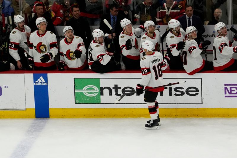 Feb 17, 2024; Chicago, Illinois, USA; Ottawa Senators center Tim Stutzle (18) celebrates his goal against the Chicago Blackhawks during the first period at United Center. Mandatory Credit: David Banks-USA TODAY Sports