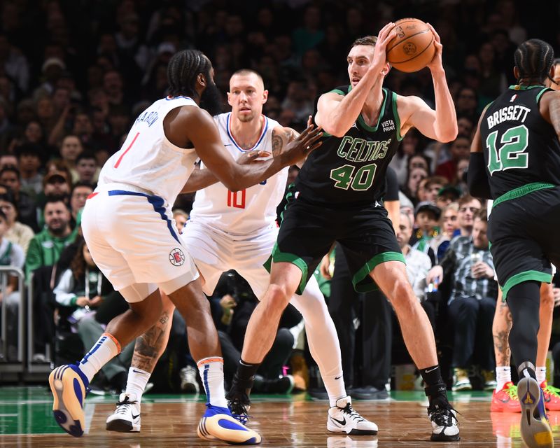 BOSTON, MA - JANUARY 27: Luke Kornet #40 of the Boston Celtics looks to pass the ball during the game against the LA Clippers on January 27, 2024 at the TD Garden in Boston, Massachusetts. NOTE TO USER: User expressly acknowledges and agrees that, by downloading and or using this photograph, User is consenting to the terms and conditions of the Getty Images License Agreement. Mandatory Copyright Notice: Copyright 2024 NBAE  (Photo by Brian Babineau/NBAE via Getty Images)