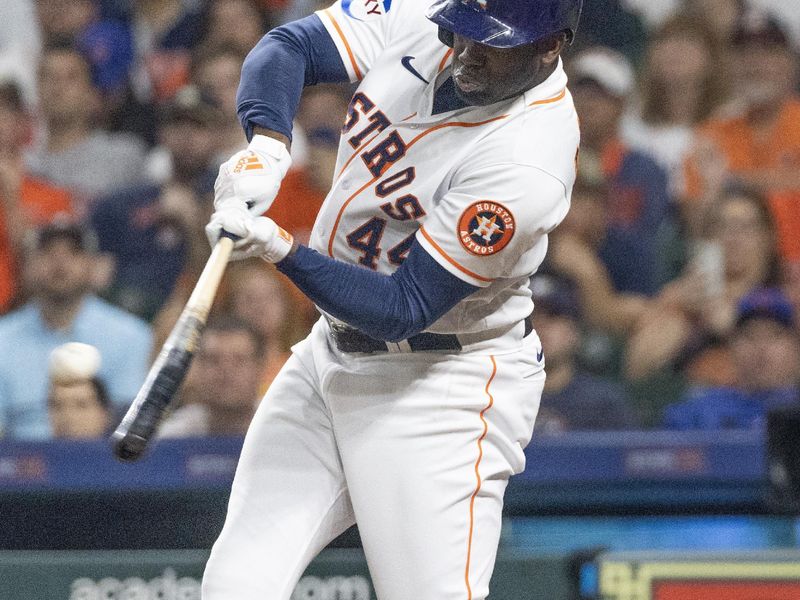 May 16, 2023; Houston, Texas, USA; Houston Astros designated hitter Yordan Alvarez (44) hits a RBI single against the Chicago Cubs in the seventh inning at Minute Maid Park. Mandatory Credit: Thomas Shea-USA TODAY Sports