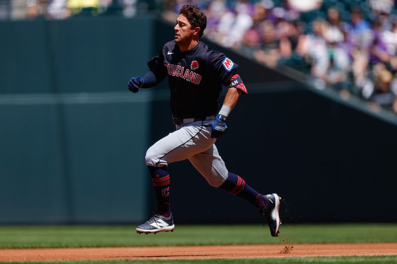 May 27, 2024; Denver, Colorado, USA; Cleveland Guardians center fielder Tyler Freeman (2) runs to second on a double in the first inning against the Colorado Rockies at Coors Field. Mandatory Credit: Isaiah J. Downing-USA TODAY Sports