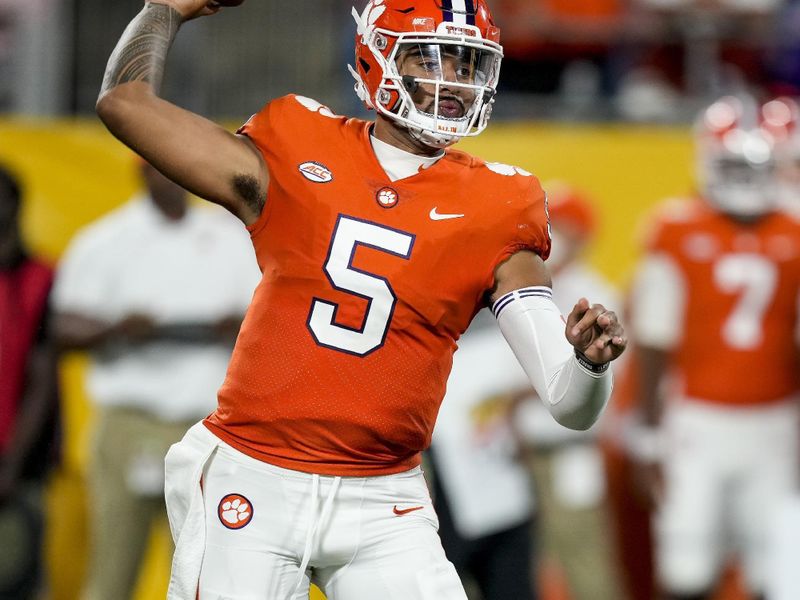 Sep 4, 2021; Charlotte, North Carolina, USA; Clemson Tigers quarterback D.J. Uiagalelei (5) throws a pass during the second half against the Georgia Bulldogs at Bank of America Stadium. Mandatory Credit: Jim Dedmon-USA TODAY Sports