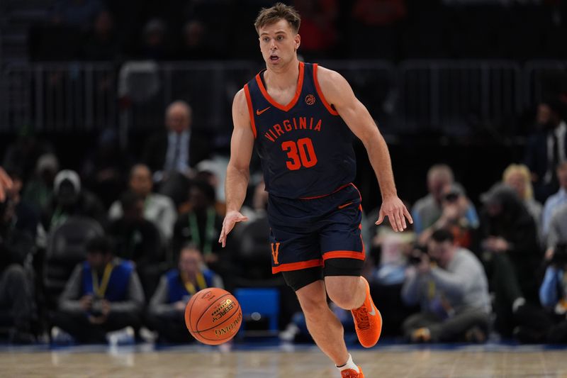 Mar 13, 2026; Charlotte, NC, USA; Virginia Cavaliers guard Dallin Hall (30) brings the ball up court against the  Hurricanes  during the first half at Spectrum Center. Mandatory Credit: Jim Dedmon-Imagn Images