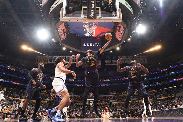 LOS ANGELES, CA - DECEMBER 18:  Anthony Davis #3 of the Los Angeles Lakers grabs the rebound during the game  on December 18, 2023 at Crypto.Com Arena in Los Angeles, California. NOTE TO USER: User expressly acknowledges and agrees that, by downloading and/or using this Photograph, user is consenting to the terms and conditions of the Getty Images License Agreement. Mandatory Copyright Notice: Copyright 2023 NBAE (Photo by Adam Pantozzi/NBAE via Getty Images)