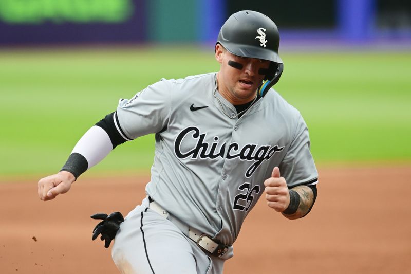 Apr 9, 2024; Cleveland, Ohio, USA; Chicago White Sox designated hitter Korey Lee (26) rounds third base en route to scoring during the first inning against the Cleveland Guardians at Progressive Field. Mandatory Credit: Ken Blaze-USA TODAY Sports