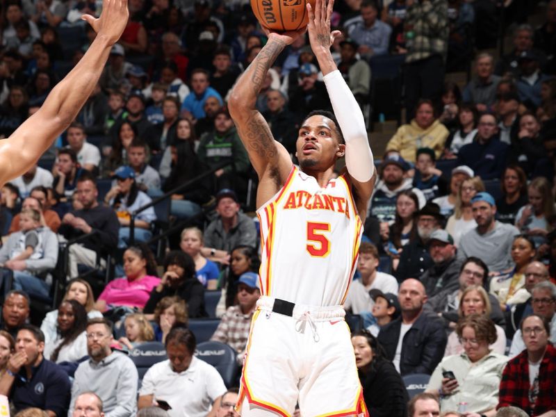 MINNEAPOLIS, MN -  APRIL 12:  Dejounte Murray #5 of the Atlanta Hawks shoots the ball during the game against the Minnesota Timberwolves on April 12, 2024 at Target Center in Minneapolis, Minnesota. NOTE TO USER: User expressly acknowledges and agrees that, by downloading and or using this Photograph, user is consenting to the terms and conditions of the Getty Images License Agreement. Mandatory Copyright Notice: Copyright 2024 NBAE (Photo by David Sherman/NBAE via Getty Images)