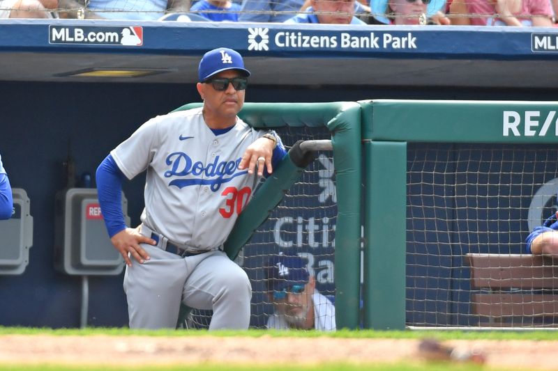 Jun 11, 2023; Philadelphia, Pennsylvania, USA; Los Angeles Dodgers manager Dave Roberts (30) in the dugout against the Philadelphia Phillies during the seventh inning at Citizens Bank Park. Mandatory Credit: Eric Hartline-USA TODAY Sports