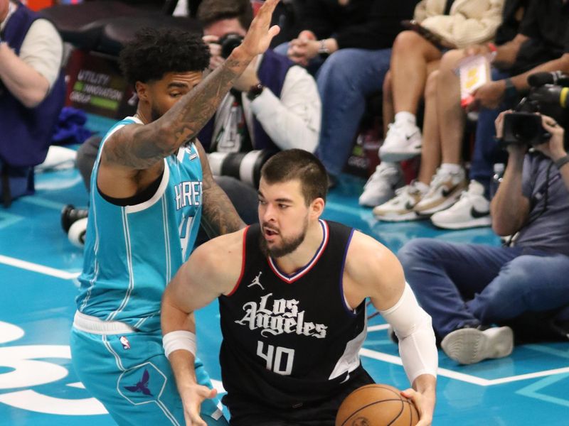 CHARLOTTE, NC - MARCH 31: Ivica Zubac #40 of the LA Clippers drives to the basket during the game against the Charlotte Hornets on March 31, 2024 at Spectrum Center in Charlotte, North Carolina. NOTE TO USER: User expressly acknowledges and agrees that, by downloading and or using this photograph, User is consenting to the terms and conditions of the Getty Images License Agreement.  Mandatory Copyright Notice:  Copyright 2024 NBAE (Photo by Brock Williams-Smith/NBAE via Getty Images)