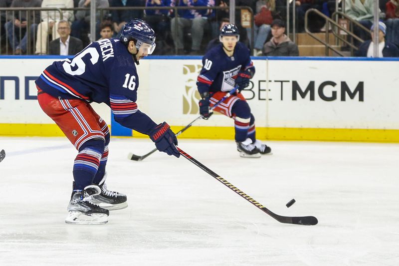 Apr 3, 2024; New York, New York, USA; New York Rangers center Vincent Trocheck (16) controls the puck in the third period against the New Jersey Devils at Madison Square Garden. Mandatory Credit: Wendell Cruz-USA TODAY Sports