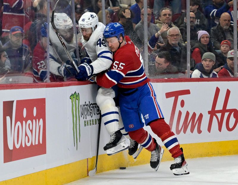 Mar 9, 2024; Montreal, Quebec, CAN; Montreal Canadiens forward Michael Pezzetta (55) checks Toronto Maple Leafs defenseman Ilya Lyubushkin (46) during the second period at the Bell Centre. Mandatory Credit: Eric Bolte-USA TODAY Sports