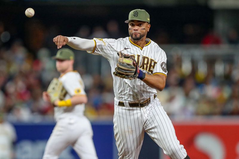 May 20, 2023; San Diego, California, USA; San Diego Padres shortstop Xander Bogaerts (2) makes the throw to first base for the out in the seventh inning against the Boston Red Sox at Petco Park. Mandatory Credit: David Frerker-USA TODAY Sports