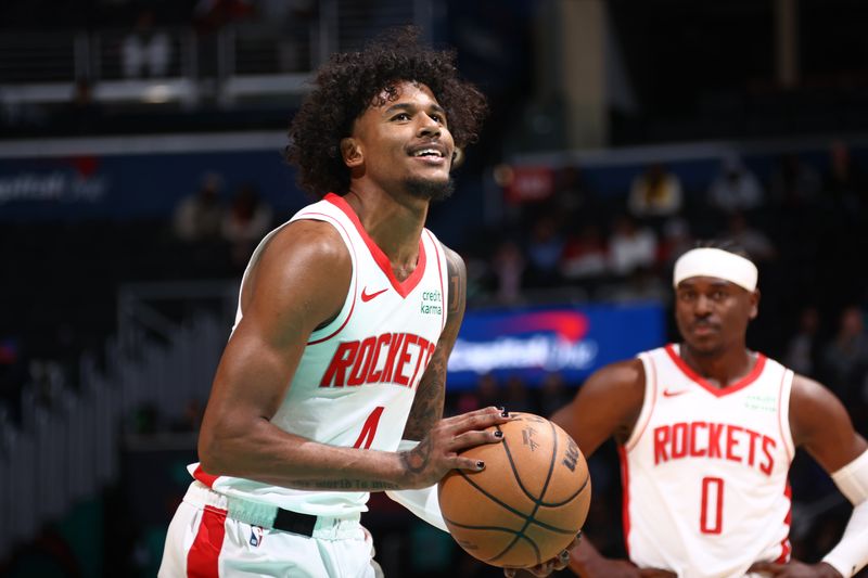 WASHINGTON, DC -? MARCH 19: Jalen Green #4 of the Houston Rockets shoots a free throw during the game against the Washington Wizards on March 19, 2024 at Capital One Arena in Washington, DC. NOTE TO USER: User expressly acknowledges and agrees that, by downloading and or using this Photograph, user is consenting to the terms and conditions of the Getty Images License Agreement. Mandatory Copyright Notice: Copyright 2024 NBAE (Photo by Kenny Giarla/NBAE via Getty Images)