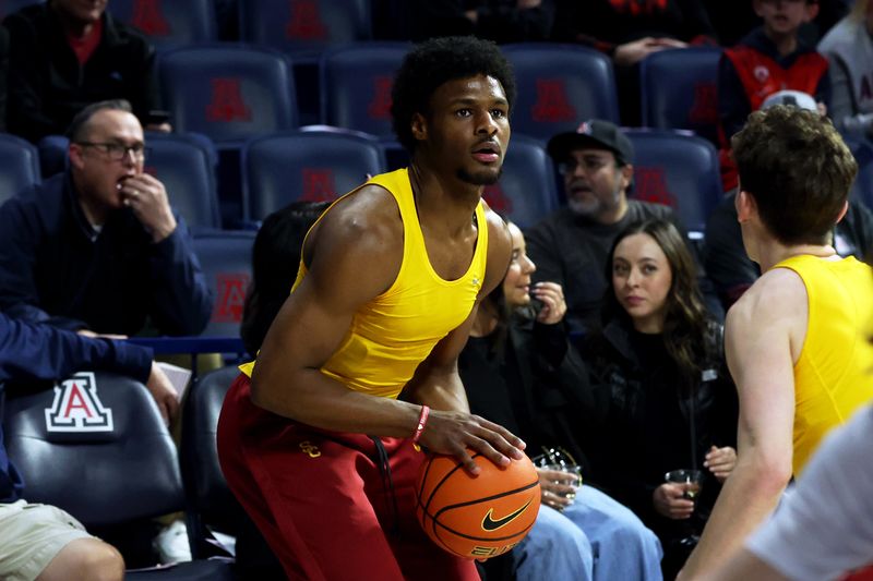 Jan 17, 2024; Tucson, Arizona, USA; USC Trojans guard Bronny James (center) warms up before a game against the Arizona Wildcats at McKale Center. Mandatory Credit: Zachary BonDurant-USA TODAY Sports