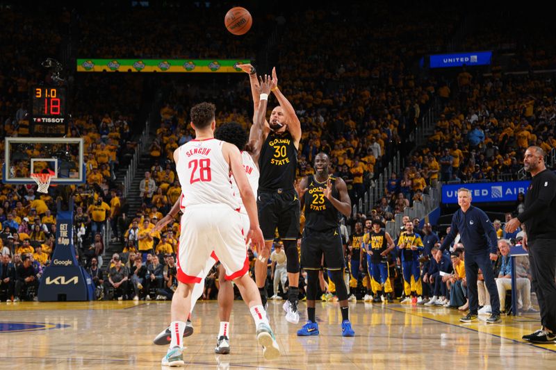 SAN FRANCISCO, CA - MAY 2:  Stephen Curry #30 of the Golden State Warriors shoots a three point basket against the Houston Rockets during Round 1 Game 6 of the 2025 NBA Playoffs on May 2, 2025 at Chase Center in San Francisco, California. NOTE TO USER: User expressly acknowledges and agrees that, by downloading and or using this photograph, user is consenting to the terms and conditions of Getty Images License Agreement. Mandatory Copyright Notice: Copyright 2025 NBAE (Photo by Jesse D. Garrabrant/NBAE via Getty Images)