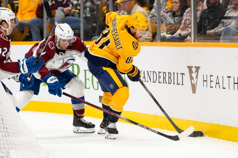 Nov 2, 2024; Nashville, Tennessee, USA;  Colorado Avalanche defenseman Devon Toews (7) pokes at the puck as Nashville Predators center Jonathan Marchessault (81) skates during the third period at Bridgestone Arena. Mandatory Credit: Steve Roberts-Imagn Images