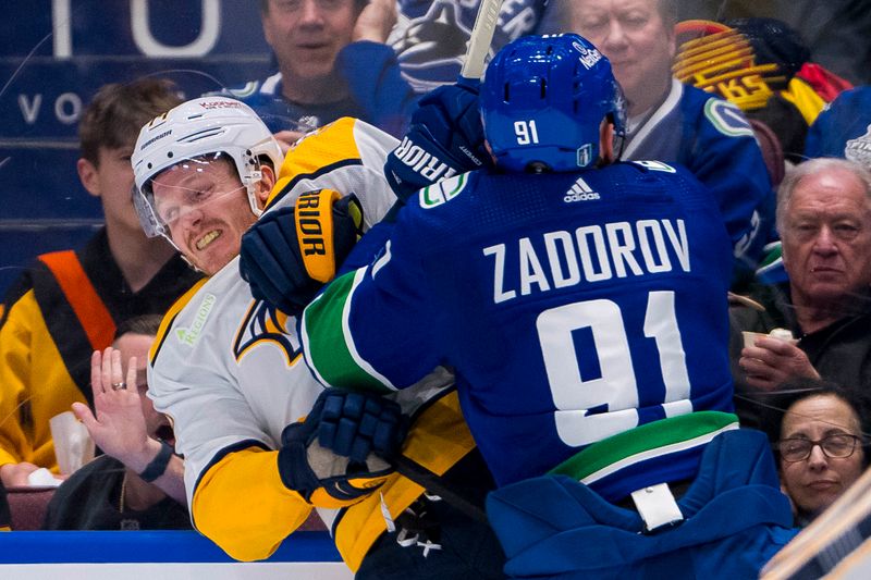 Apr 21, 2024; Vancouver, British Columbia, CAN; Vancouver Canucks defenseman Nikita Zadorov (91) checks Nashville Predators forward Gustav Nyquist (14) in the second period in game one of the first round of the 2024 Stanley Cup Playoffs at Rogers Arena. Mandatory Credit: Bob Frid-USA TODAY Sports