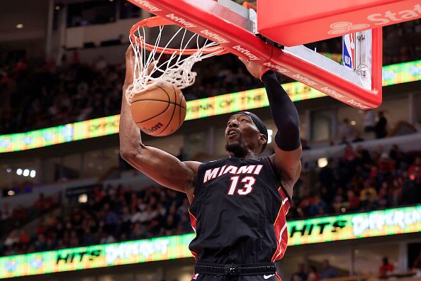 CHICAGO, ILLINOIS - NOVEMBER 20: Bam Adebayo #13 of the Miami Heat dunks the ball during the first half in the game against the Chicago Bulls at the United Center on November 20, 2023 in Chicago, Illinois. NOTE TO USER: User expressly acknowledges and agrees that, by downloading and or using this photograph, User is consenting to the terms and conditions of the Getty Images License Agreement. (Photo by Justin Casterline/Getty Images)