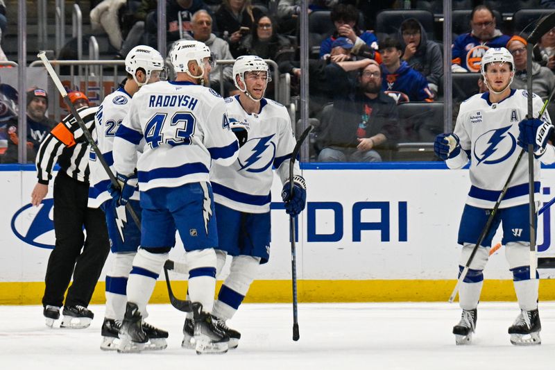 Dec 13, 2025; Elmont, New York, USA; Tampa Bay Lightning defenseman Darren Raddysh (43) celebrates his goal against the New York Islanders during the second period at UBS Arena. Mandatory Credit: Dennis Schneidler-Imagn Images