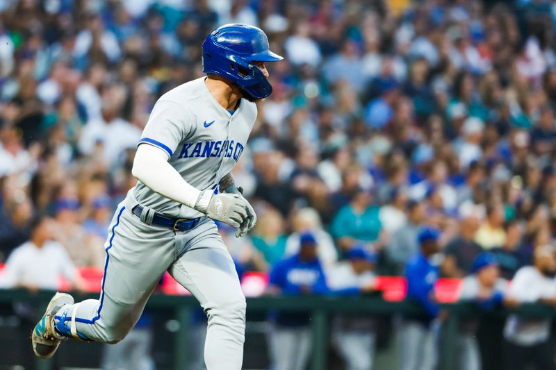 Aug 25, 2023; Seattle, Washington, USA; Kansas City Royals center fielder Kyle Isbel (28) advances to first base for an RBI-single against the Seattle Mariners during the second inning at T-Mobile Park. Mandatory Credit: Joe Nicholson-USA TODAY Sports