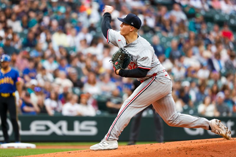 May 30, 2025; Seattle, Washington, USA; Minnesota Twins starting pitcher Zebby Matthews (52) throws against the Seattle Mariners during the first inning at T-Mobile Park. Mandatory Credit: Joe Nicholson-Imagn Images