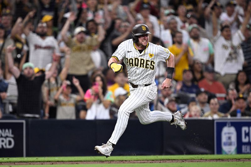 Jun 25, 2024; San Diego, California, USA; San Diego Padres second baseman Jake Cronenworth (9) advances home to score a run against the Washington Nationals during the fifth inning at Petco Park. Mandatory Credit: Orlando Ramirez-USA TODAY Sports