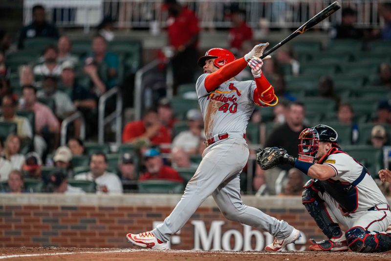 Sep 6, 2023; Cumberland, Georgia, USA; St. Louis Cardinals catcher Willson Contreras (40) hits a home run against the Atlanta Braves during the seventh inning at Truist Park. Mandatory Credit: Dale Zanine-USA TODAY Sports