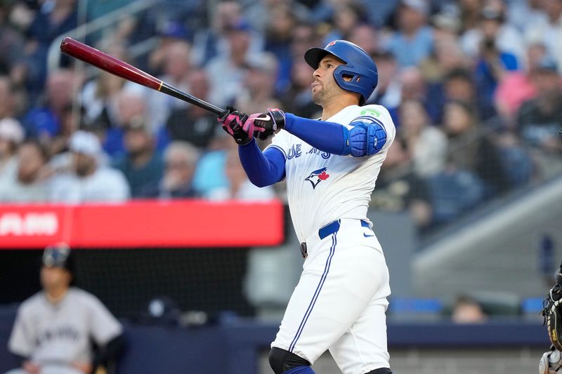 Jun 27, 2024; Toronto, Ontario, CAN; Toronto Blue Jays right fielder George Springer (4) hits his second home run of the game against the New York Yankees during the second inning at Rogers Centre. Mandatory Credit: John E. Sokolowski-USA TODAY Sports