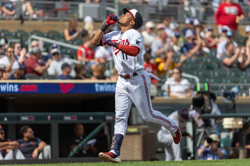 Aug 16, 2023; Minneapolis, Minnesota, USA; Minnesota Twins designated hitter Jorge Polanco (11) celebrates after hitting a two run home run against the Detroit Tigers in the ninth inning at Target Field. Mandatory Credit: Jesse Johnson-USA TODAY Sports