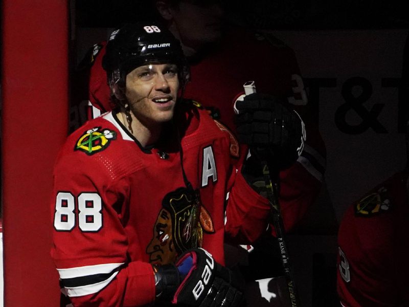 Jan 22, 2023; Chicago, Illinois, USA; Chicago Blackhawks right wing Patrick Kane (88) sits on the edge of the bench during the first period at United Center. Mandatory Credit: David Banks-USA TODAY Sports