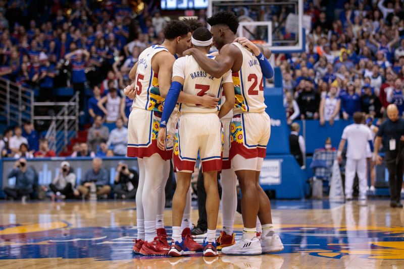 Feb 18, 2023; Lawrence, Kansas, USA; Kansas Jayhawks huddle mid court prior to the game against the Baylor Bears at Allen Fieldhouse. Mandatory Credit: William Purnell-USA TODAY Sports