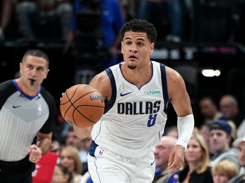 DALLAS, TX - OCTOBER 20: Josh Green #8 of the Dallas Mavericks dribbles the ball during the game against the Detroit Pistons on October 20, 2023 at the American Airlines Center in Dallas, Texas. NOTE TO USER: User expressly acknowledges and agrees that, by downloading and or using this photograph, User is consenting to the terms and conditions of the Getty Images License Agreement. Mandatory Copyright Notice: Copyright 2023 NBAE (Photo by Glenn James/NBAE via Getty Images)